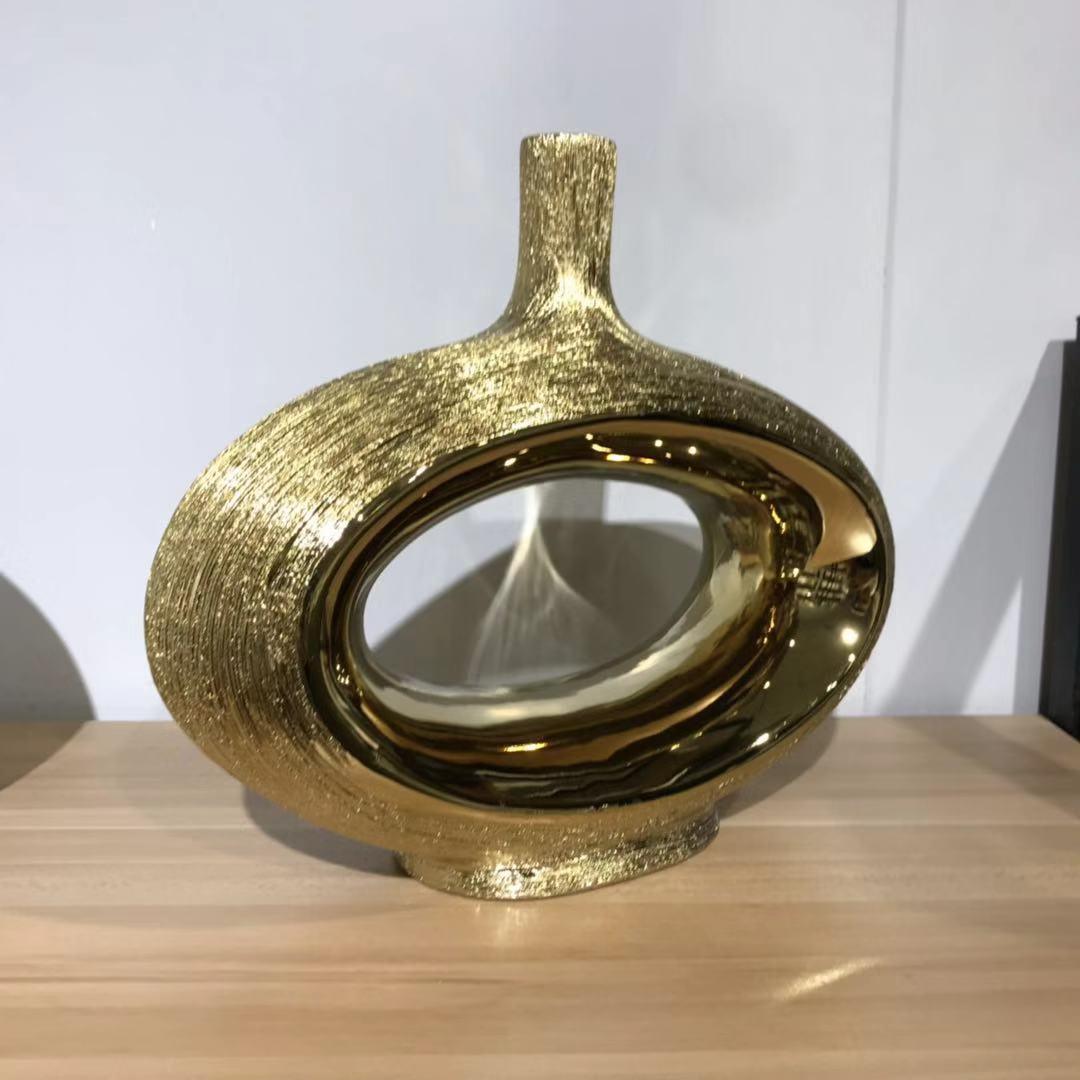 GOLDEN CERAMIC VASE