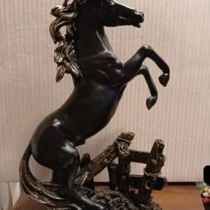 DISCERNING JUMPING HORSE STATUE