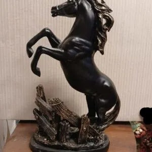 DISCERNING JUMPING HORSE STATUE