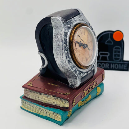 DECORATIVE WRIST WATCH ON BOOKS