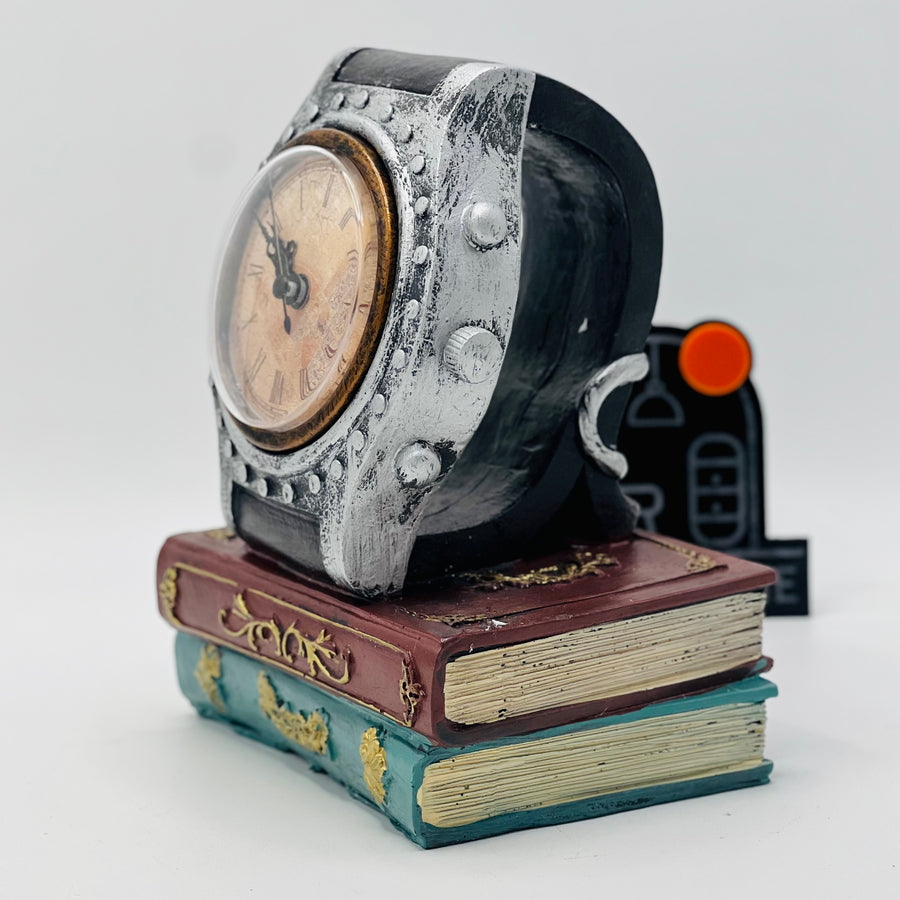 DECORATIVE WRIST WATCH ON BOOKS