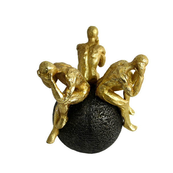 ZART MAN SITTING GROUP ON BALL STATUE