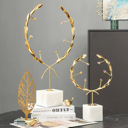 METALLIC ORNAMENT WITH MARBLE BASE