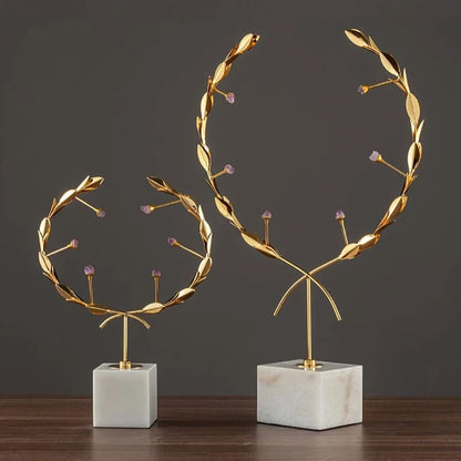 METALLIC ORNAMENT WITH MARBLE BASE